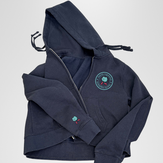 Navy blue hoodie with a circular logo on a light gray background