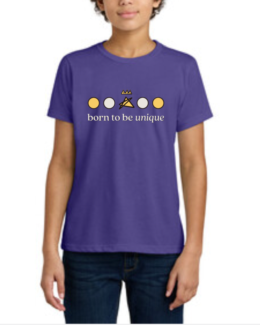 Child wearing a purple t-shirt with a colorful design and 'born to be unique' text 